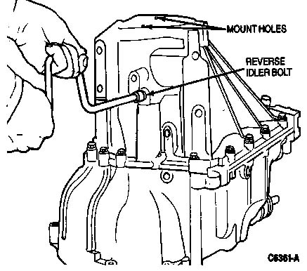 Reverse idler retaining bolt. REMOVE